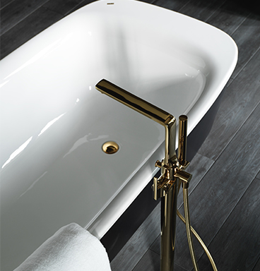 VitrA Water Jewels bath with gold bath tap